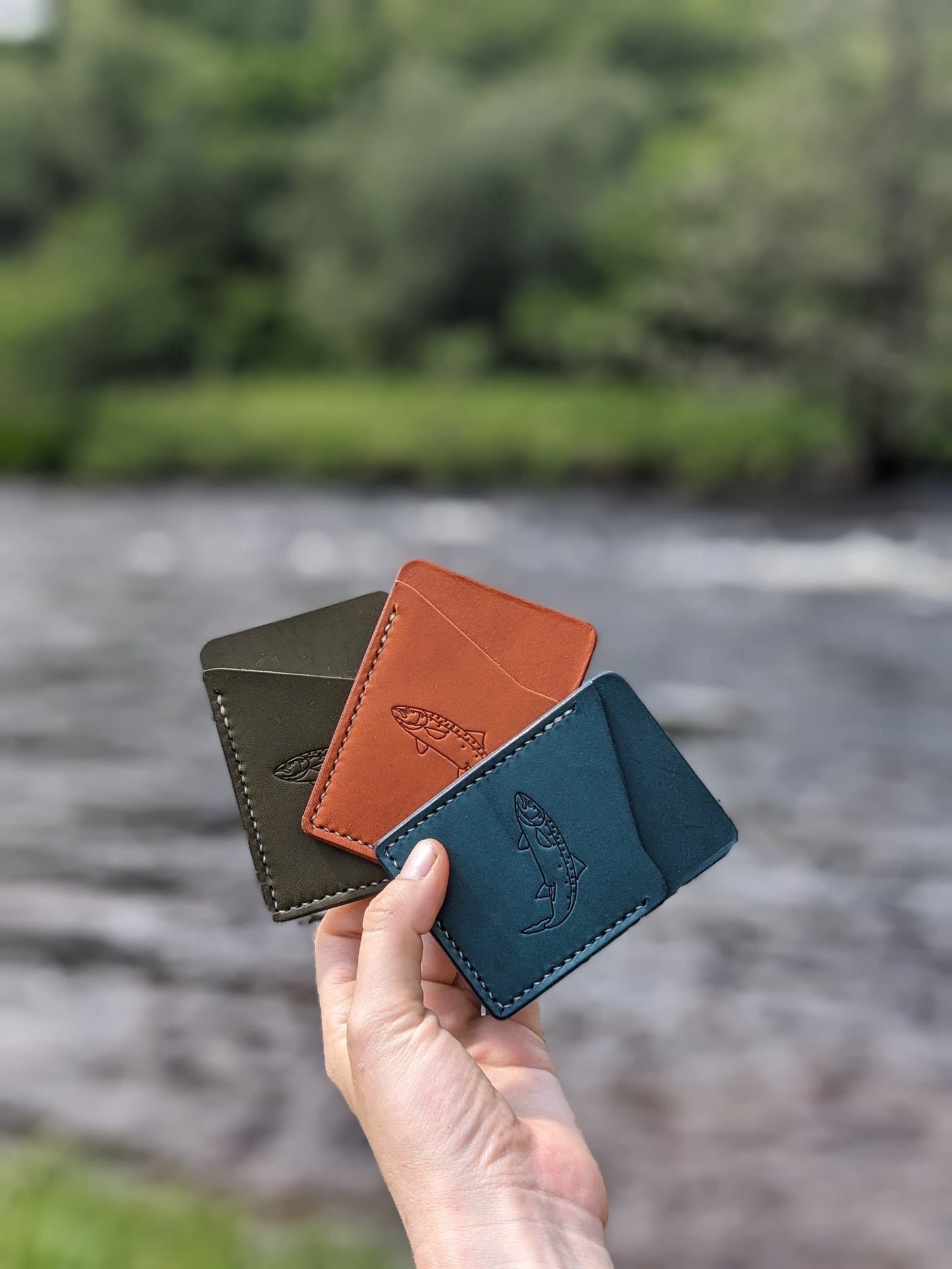 65538f7a329f1a3a70a34bd9_all-three-wallets-together-salmon-2_1759913047939.jpg
