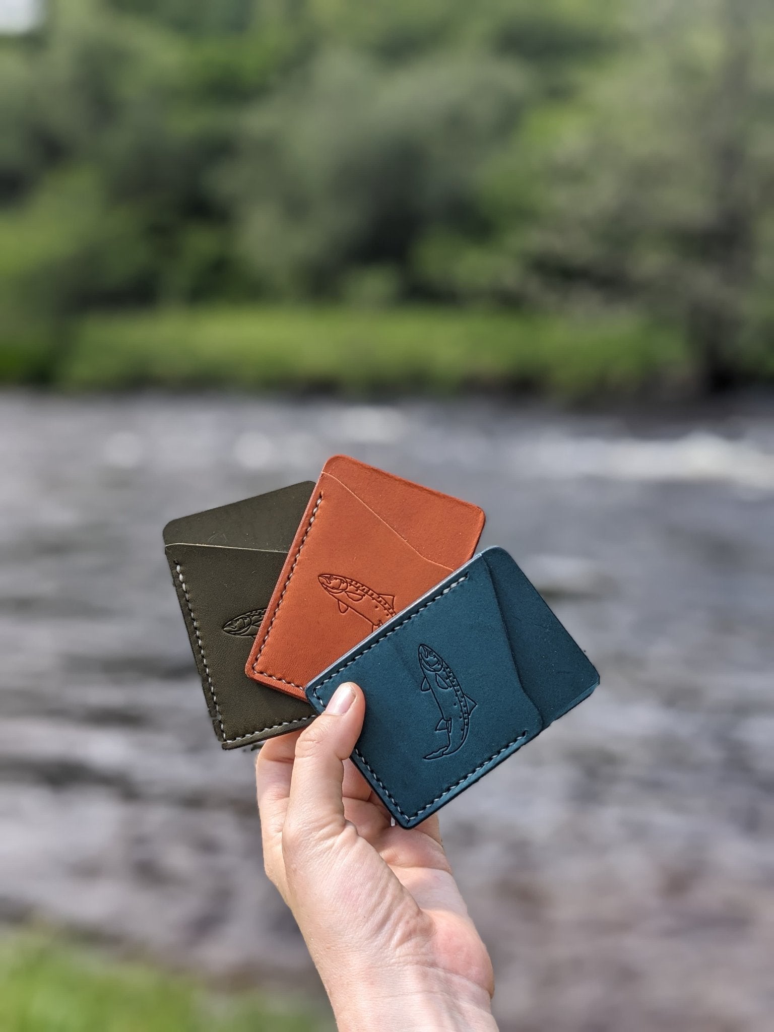 65538f7a329f1a3a70a34bd9_all-three-wallets-together-salmon-2_1759913047939.jpg
