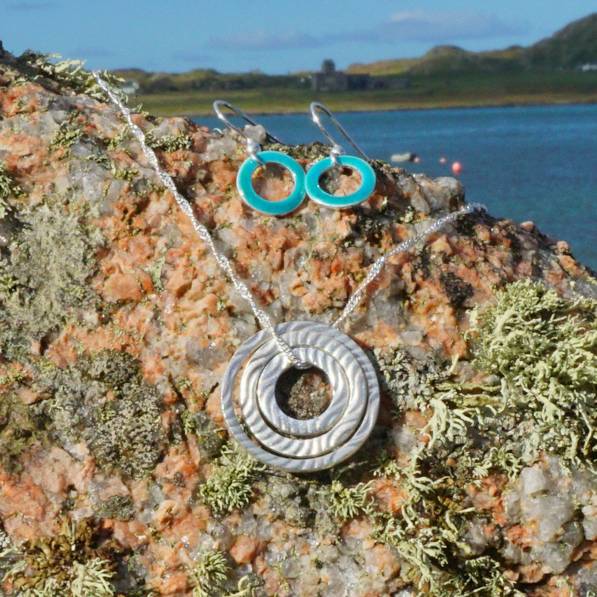 65538f7a329f1a3a70a34bd9_iona-blues-pendant-reverse_1793025527346.jpg